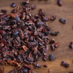 Cacao or cocoa raw beans, crushed to nibs, superfood